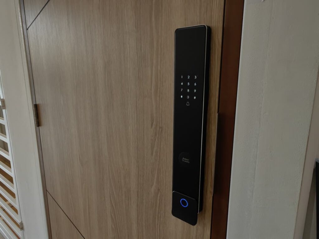 Avant Guard smart lock installed on a wooden main door