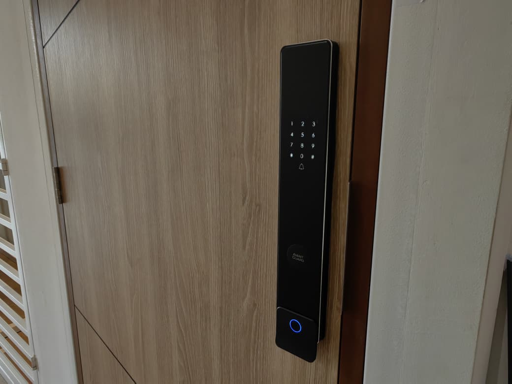 Avant Guard smart lock installed on a wooden main door