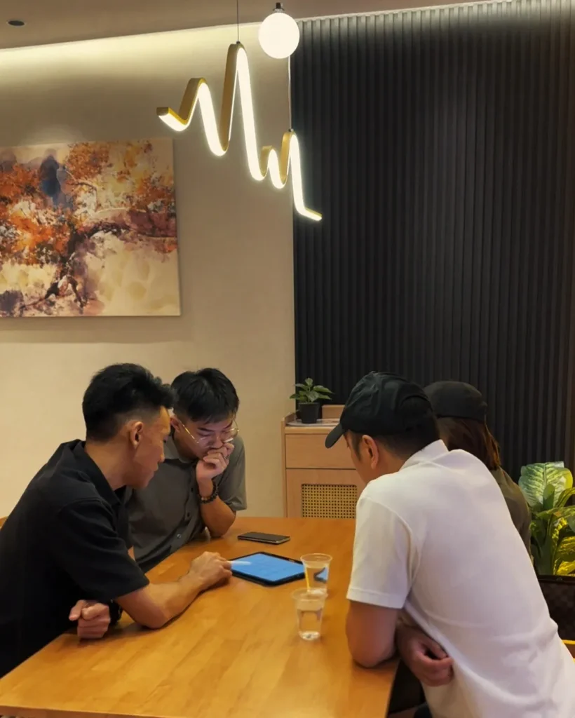 Avant Guard consultant walking homeowners through a smart home plan at the SPHERE Damansara showroom